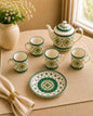 Exquisite hand  motifs on a - Tea Set with two elegant serving plates